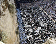 Orthodox Jews attend a blessing ceremony at the wall in 2003