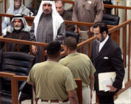 Saddam arrived with a copy ofthe Quran, papers and files