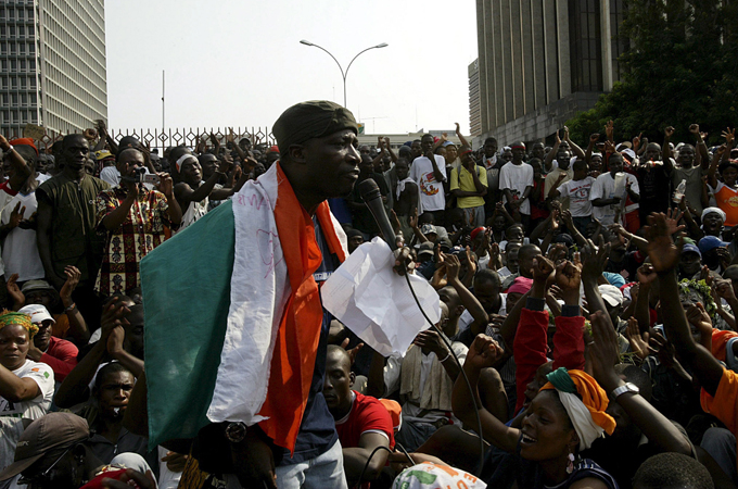 Ble Goude says he and his supporters are the 'solution' to the country's problems [EPA]