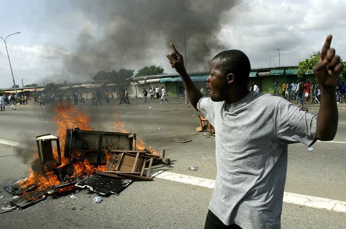 Opponents of Gbagbo are demanding that he step down and that elections are held [EPA]
