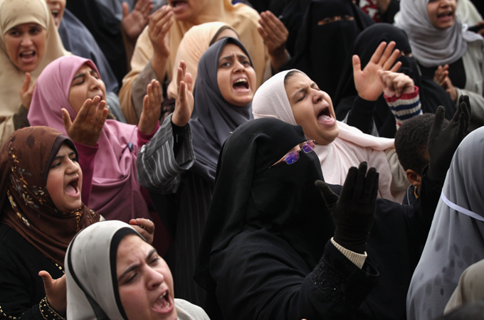 Women chant anti-Mubarak slogans in Tahrir Square