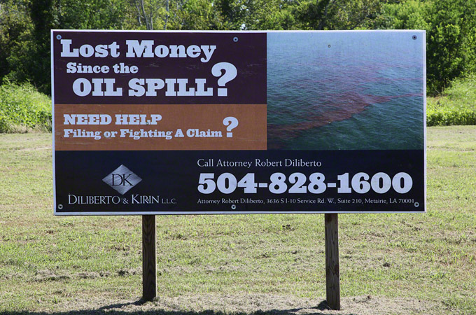 Oil spill lawsuit sign