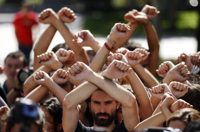 Demonstrators protest against collective bargaining reforms in front of Spain''s labour ministry in Madrid