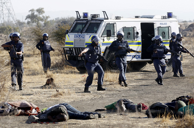 Miners protest South Africa police open fire