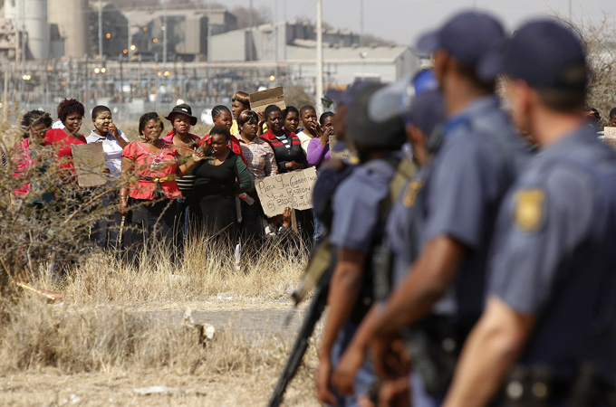 Women in South Africa protest against killing of miners by police