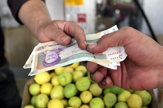 Iran curency fell to a new record low ...