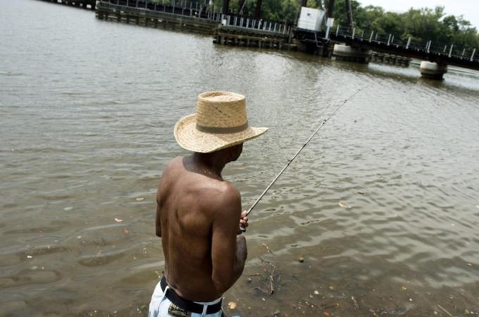 Kojak Halfacre fishes along the Anacosti