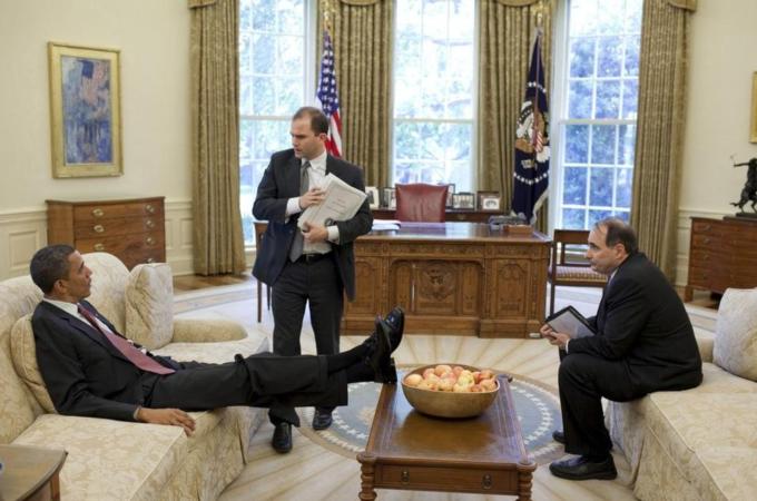 White House handout shows U.S. President Obama talks with Deputy National Security Advisor for Strategic Communication Rhodes and Senior Advisor Axelrod in the Oval Office
