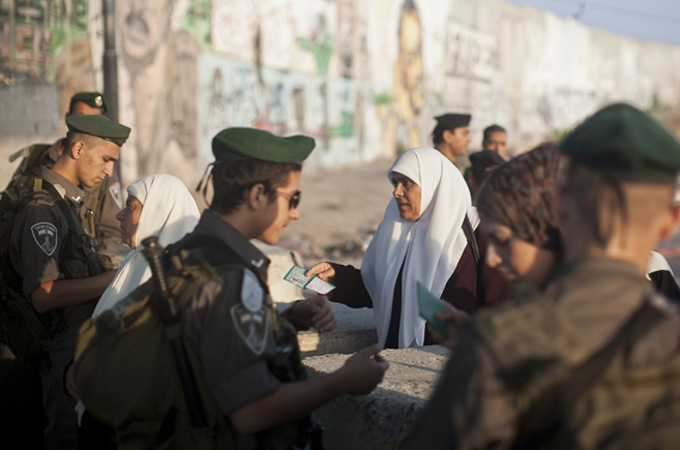 The system of ID cards is used as a weapon to further cement the fragmentation of the Palestinian population as it confines the Palestinians to their geographic Israeli-controlled Bantustans [EPA]