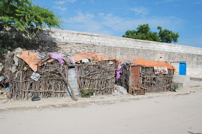 Home in informal encampment for IDPs in Mogadishu [Laila Ali/Al Jazeera]