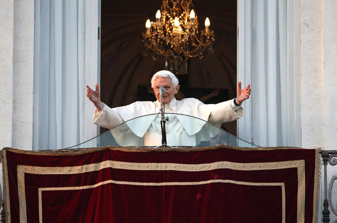 Pope Benedict XVI waves to the faithful
