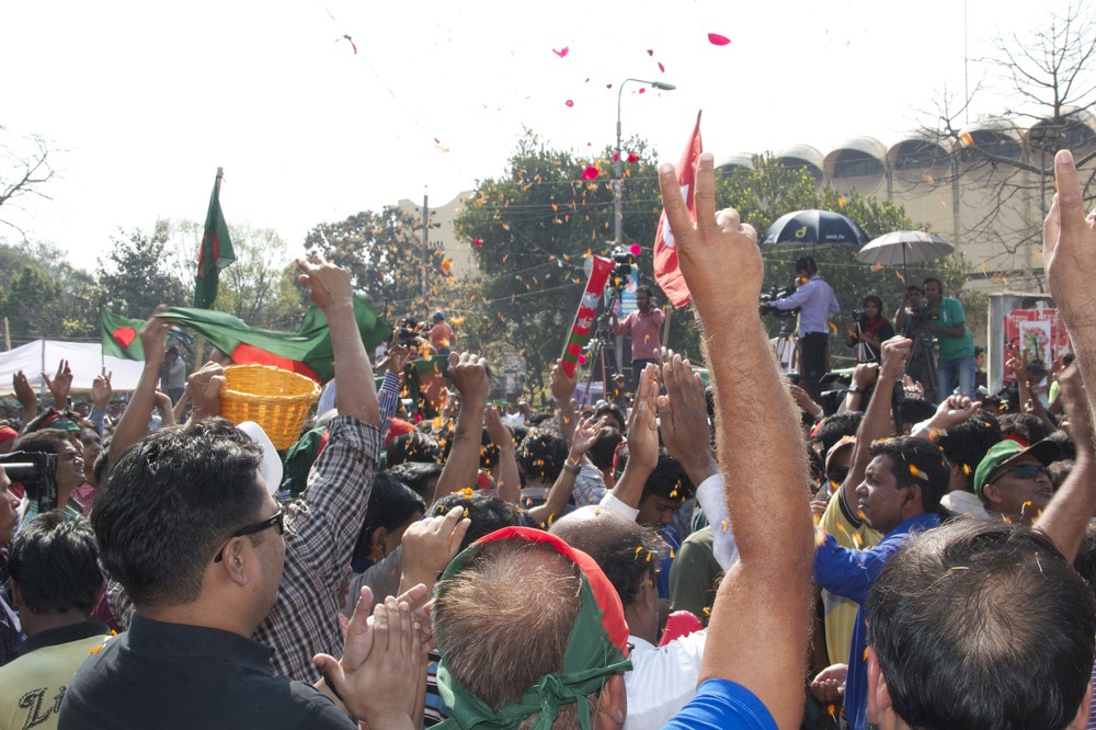 Flower petals are thrown in celebration of the death verdict for Delwar Hossain Sayedee, one of the top leaders of Jamaat-e-Islami, the country(***)s largest Islamic party.