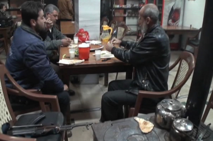 Syria restaurant soldiers on