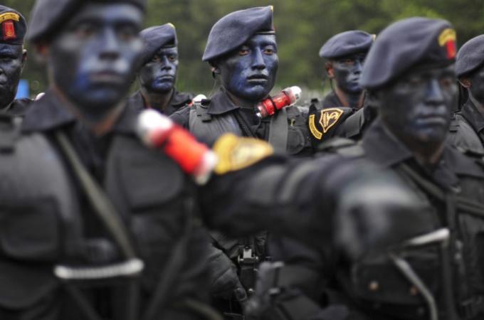 Guatemalan army troops parade during the