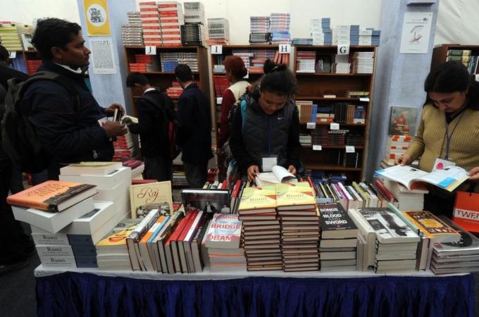 Visitors browse through books during Jai