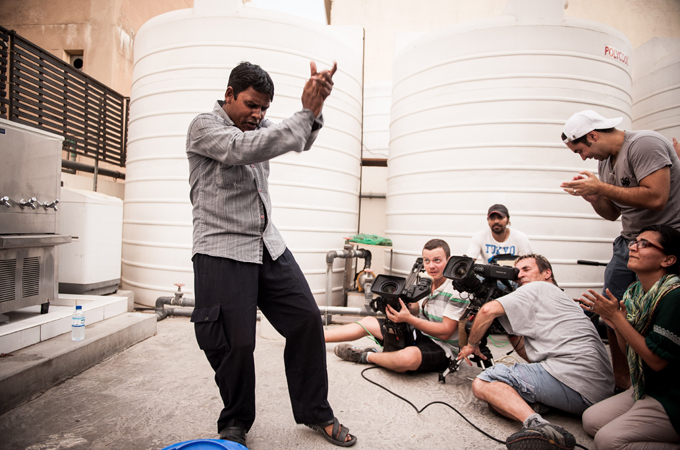 A contestant is filmed rehearsing his number for the Western Union Camp Ka Champ contest in 2012