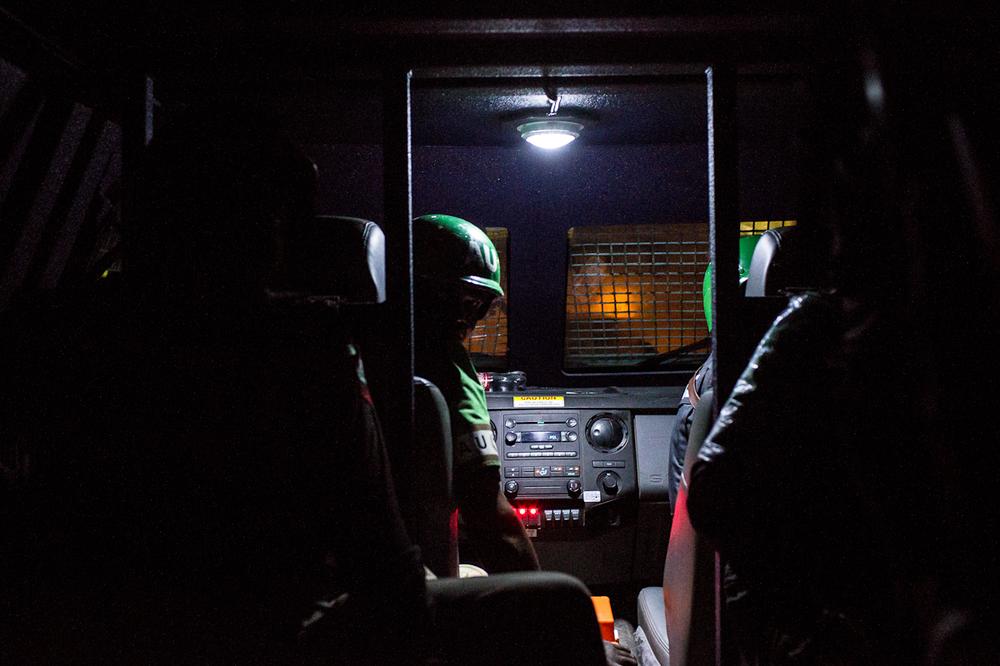 <p>A convoy of AMISOM Formed Police Units (FPU) in armoured vehicles leave the national stadium to rendezvous with their Somali counterparts for a late night patrol in Mogadishu. </p>