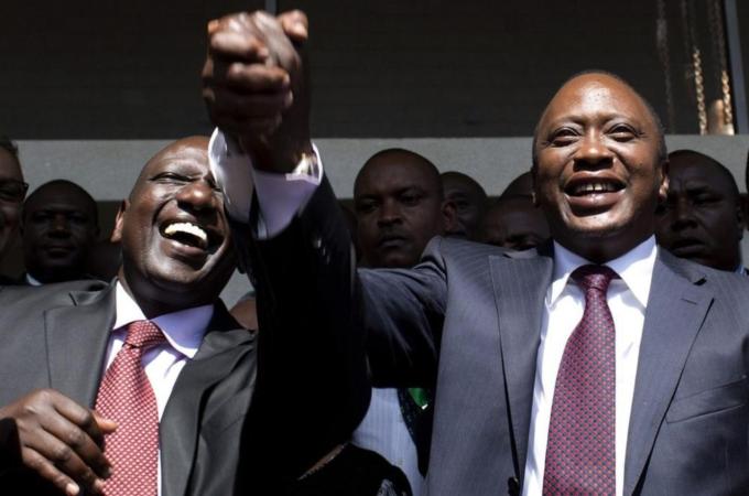 File photo of then President-elect Kenyatta greeting his supporters with his running mate Ruto after attending a news conference in Nairobi