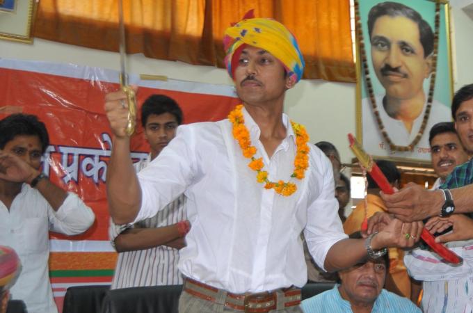 Olympian Rajyavardhan Singh Rathore at a BJP function [Shahnawaz Akhtar/ Al Jazeera]