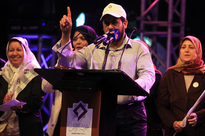 Abdul-Hakim Belhaj (C), senior member of the Islamist Party al-Watan addresses his supporters during an election rally in Tripoli, Libya, 04 July 2012. [EPA]
