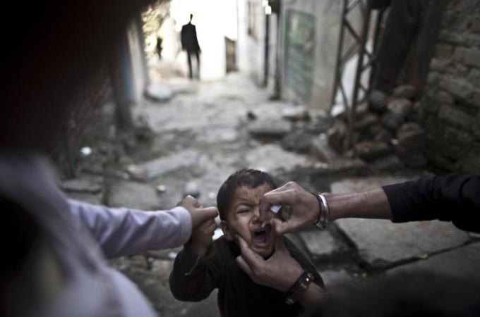 Those attacking polio workers claim they are spies or that the vaccination will make Muslim children sterile [AP]