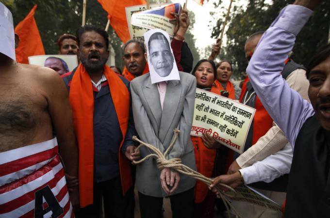 Protests have been held across Indian cities, deploring the arrest of Indian envoy in New York [AP]