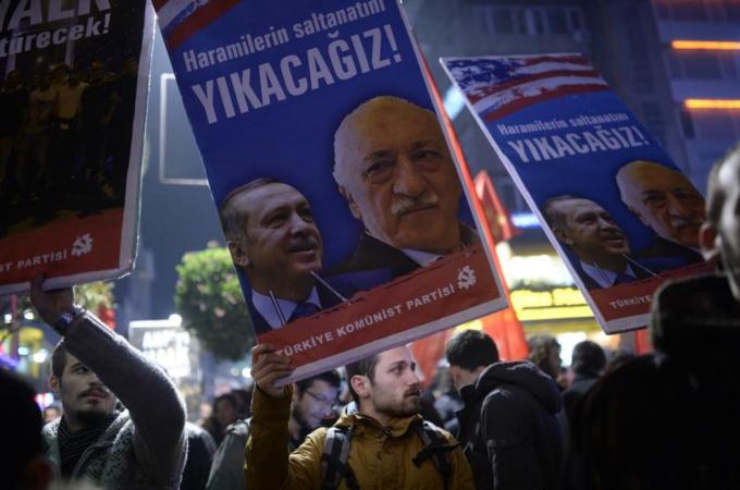 Turkish PM Erdogan is trying to dismantle parts of Fetullah Gulen's Hizmet Movement [AFP]