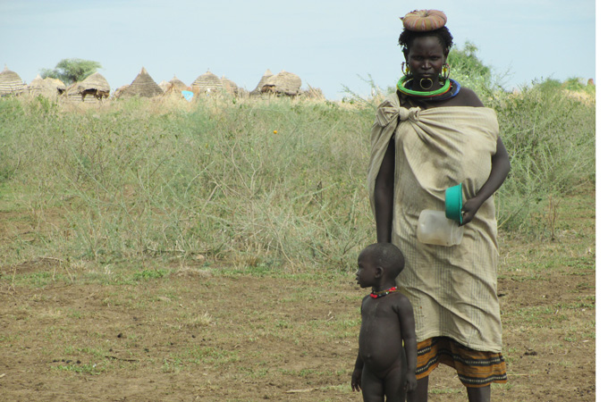 A Toposa speaking woman and her child from Loriwo village in Mogos, a remote area of South Sudan [Shadow Pictues/Al Jazeera]