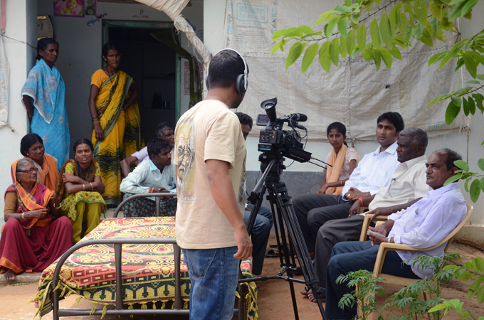 Director of Indian Hospital Revisited, Gautam Singh, on location in the village of Yaradona, in south India [Al Jazeera]