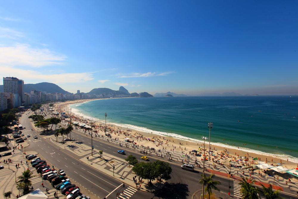 Rio de Janeiro(***)s famous Copacabana Beach features a massive TV screen where thousands of people gathered on Saturday to watch Brazil in action against Chile in the round of 16 of the 2014 World Cup. 