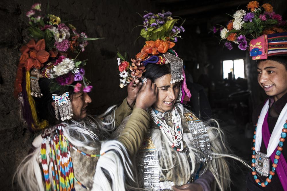 <p>A family in Dhahanu, famously called as (***)last Aryan village(***) wear traditional dresses made of sheep(***)s wool.</p>