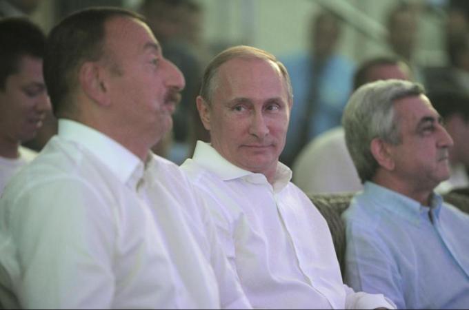 Russian President Vladimir Putin has hosted a meeting between Azerbaijani President Ilham Aliyev and Armenian President Serzh Sargsyan over tensions in the Nagorno-Karabakh region [Reuters]