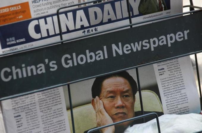 Security chief Zhou's fall has proven that even top Chinese party officials can be subject to an inquiry [Reuters]
