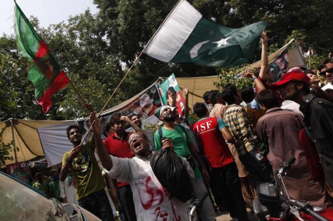 Imran Khan, the chairman of the Pakistan Tehreek-e-Insaf (PTI) political party, led an anti-government march to Islamabad [Reuters]