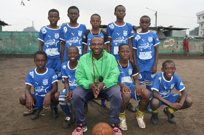 The MG football centre in Anoumabo village in Abidjan is led by coach Richard [Kingsley Kobo/Al Jazeera]