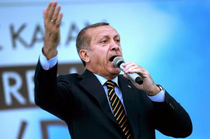 Turkish Prime Minister and presidential candidate of the ruling party in the August election, Recep Tayyip Erdogan addresses his supporters in Istanbul, Turkey, Friday July 25, 2014. (AP Photo/Emrah G