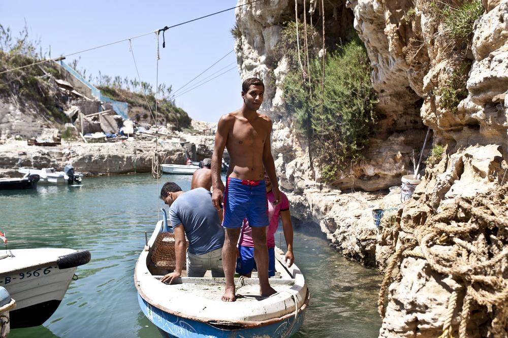 <p>Mahmoud Krombi, 25 is one of the younger fishermen working at the Daliyeh fishing port. (***)Even the seaweed [which is vital to trap fishing] is dying from pollution,(***) he said.</p>