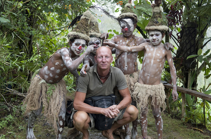 Photographer Jimmy Nelson with members of Papua New Guinea's Goroka tribe [Jimmy Nelson pictures BV]