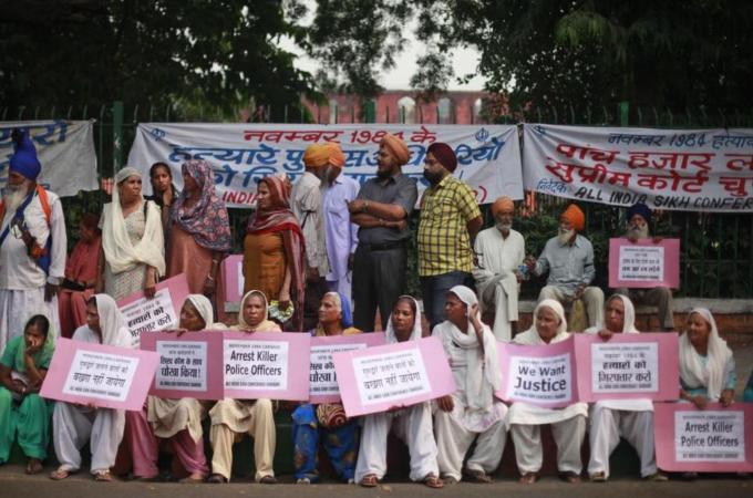 Indian Sikh women demand justice for victims of the 1984 massacre of Sikhs [AP]