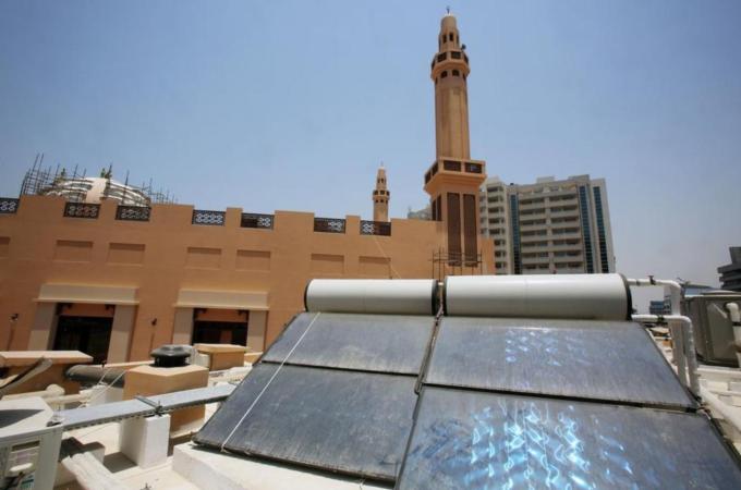 Solar panels on the roof top of the green mosque in Dubai [AP]
