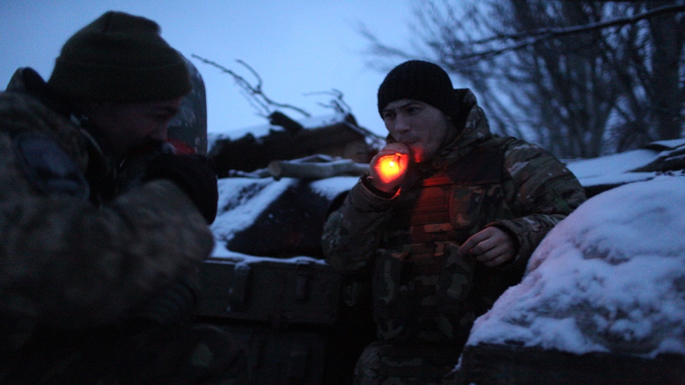 Men from the Dnipro-1 Battalion in a trench in Pisky [John Wendle] 