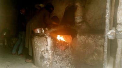 Household fuel supplies are supplemented with cardboard scraps [Mohammed al-Qalisi]