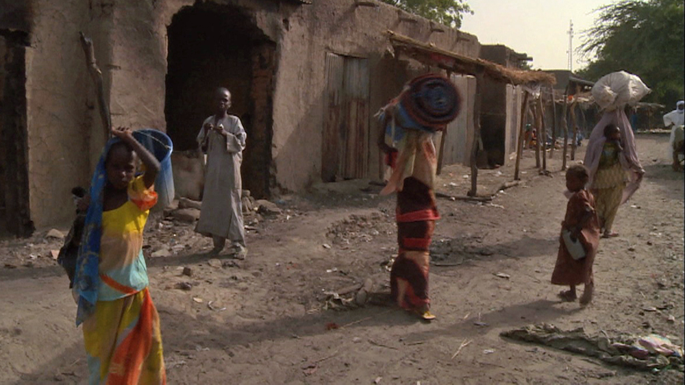 Violence and destruction has thrown thousands of refugees out of their homes and onto the roads [Al Jazeera]