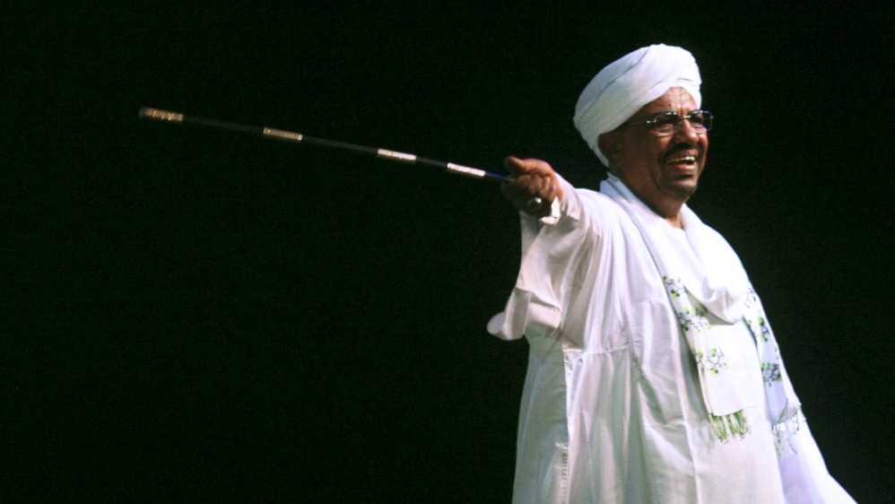 Sudan''s President al-Bashir speaks to the crowd after a swearing-in a ceremony at green square in Khartoum