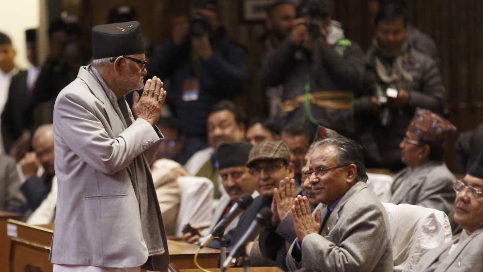Nepal''s PM Koirala greets Chairman of the ruling party Unified Communist Party of Nepal, Prachanda as he arrives to attend the constitution assembly meeting at the parliament