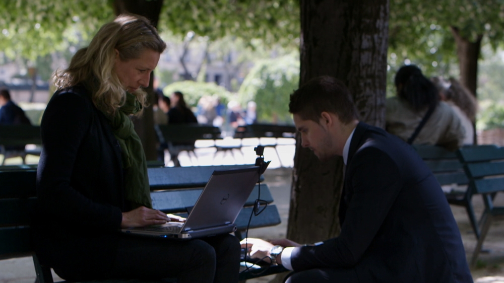 Juliana Ruhfus with computer programmer Jean-Pierre Lesueur, the creator of a spying software called Dark Comet [Al Jazeera]