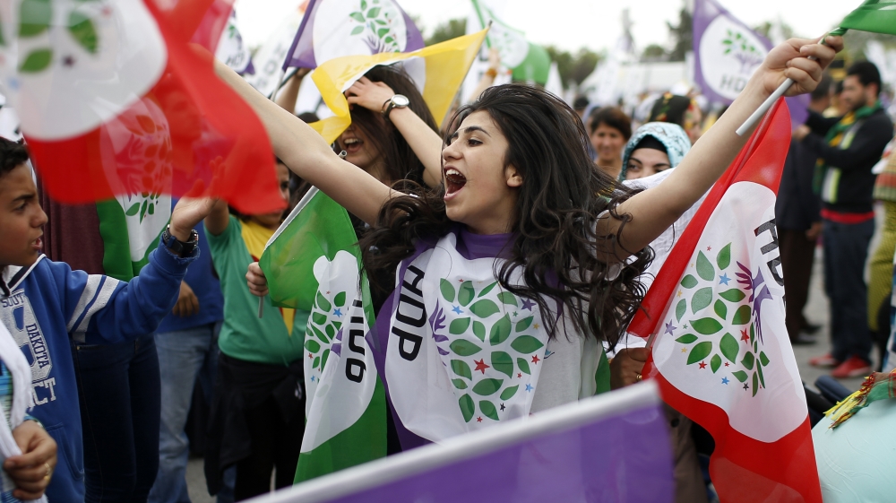 Supporters cheer Selahattin Demirtas, co-chair of the pro-Kurdish Peoples'' Democratic Party, HDP, as he addres