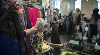Many shops have opened that cater to Russian Muslim clients [Alexander Zemlianichenko/AP]