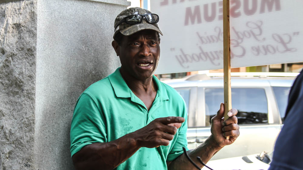 Willie Hudspeth has been protesting the monument for the last 15 years  [Shaghayegh Tajvidi/Al Jazeera]