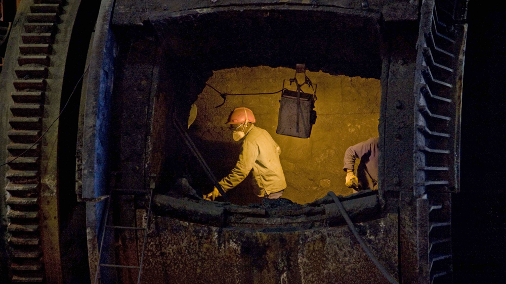 Miners work at Impala Platunum mine, near Rustenburg in 2008. [Greg Marinovich/The Stand/Al Jazeera]